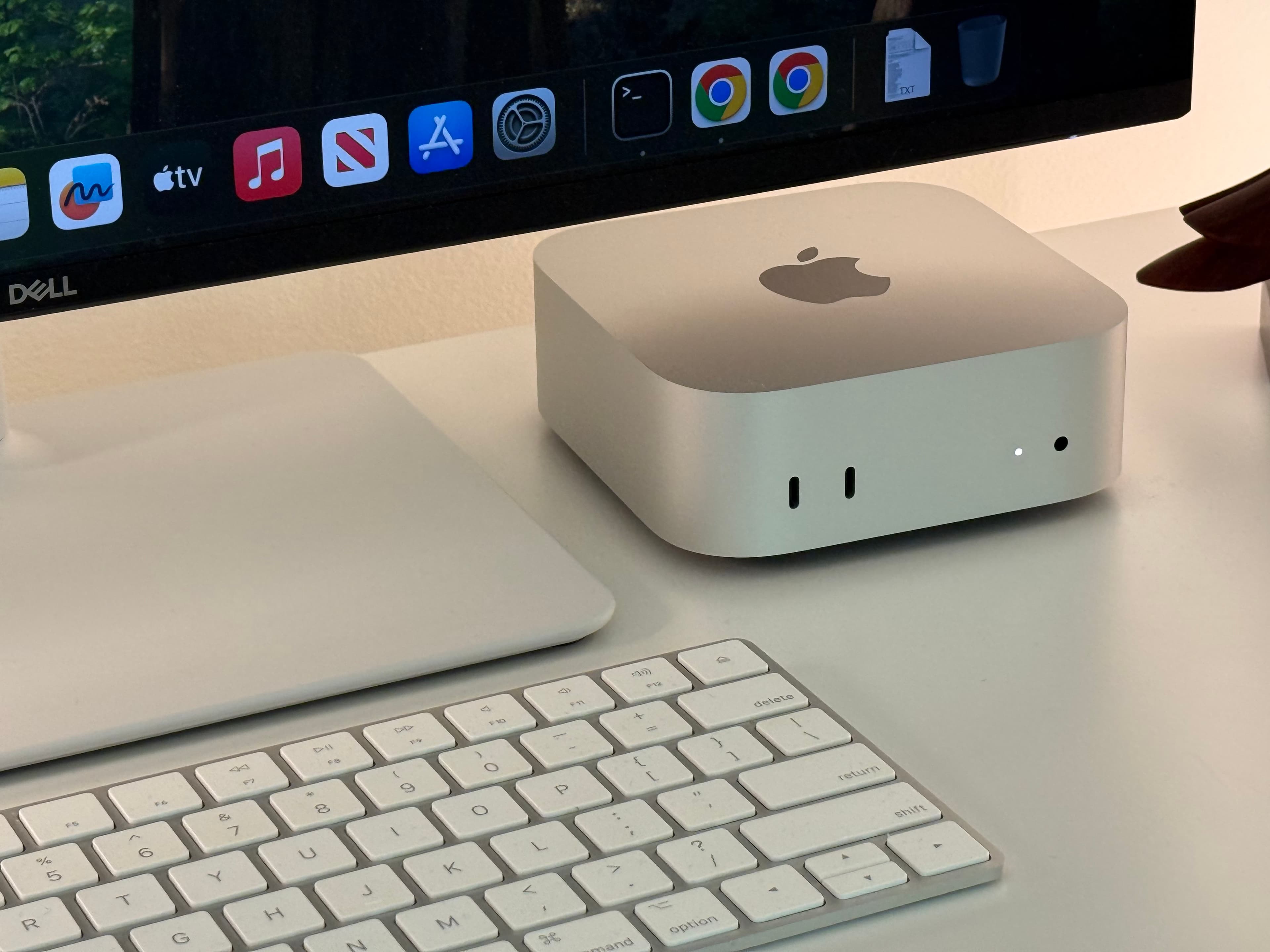 Mac Mini at the Maai Services workstation — the dedicated hardware that runs autonomous digital employees